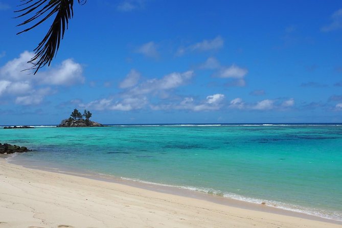 Beaches, swimming & snorkeling | Mahe, Seychelles | Private Tour - Anse à la Mouche: shallow water and a cold drink